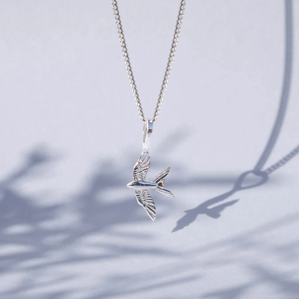 Bird in flight design necklace